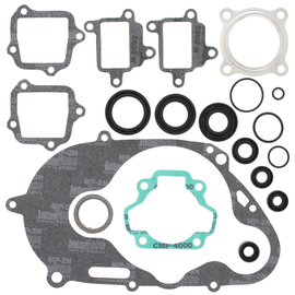 Vertex complete gasket set with oil seals, showing various gaskets and seals arranged for engine sealing and repair.