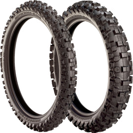 Bridgestone Motocross M404 rear tire 90/100-14 bias tire with tread pattern, mounted on wheel for off-road riding.