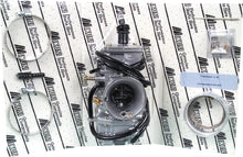 Load image into Gallery viewer, Mikuni TMX 38mm flat slide carburetor kit for motorcycle fuel system, shown with metal components and throttle slide.