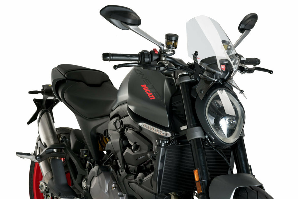 Clear PUIG windscreen for Naked New Gen Sport motorcycle, showing the sleek, transparent design fitted on the bike.