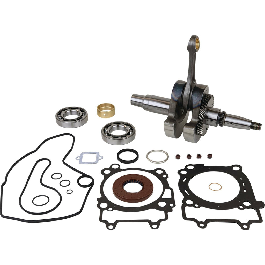 Hot Rods Hot Rods Bottom End Kit 421-HR0210 engine components, including crankshaft, pistons, and connecting rods, on a workbench.