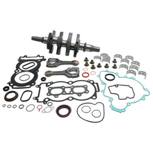 Load image into Gallery viewer, Hot Rods Bottom End Kit Pol 421-HR0110 engine components with pistons, crankshaft, and connecting rods arranged on a work surface.