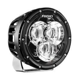 RIGID Industries 360-Series 6-inch laser amber back light mounted on a vehicle, showing the light's bright amber laser illumination.