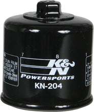Load image into Gallery viewer, K&amp;N Oil Filter 56-0204 for engine oil filtration, showing the cylindrical filter with K&amp;N branding and metal top.