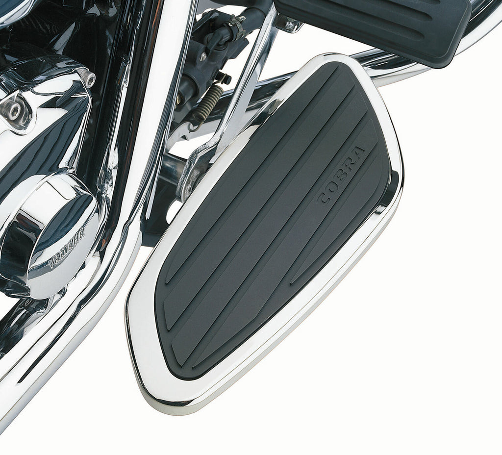 Cobra swept rider floorboards for Yamaha Stryker 2011-2018 motorcycle, black foot controls with textured surfaces.