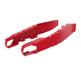 Red Polisport Plastics swingarm protectors for Honda CR bikes, made of durable plastic for motorcycle body protection.