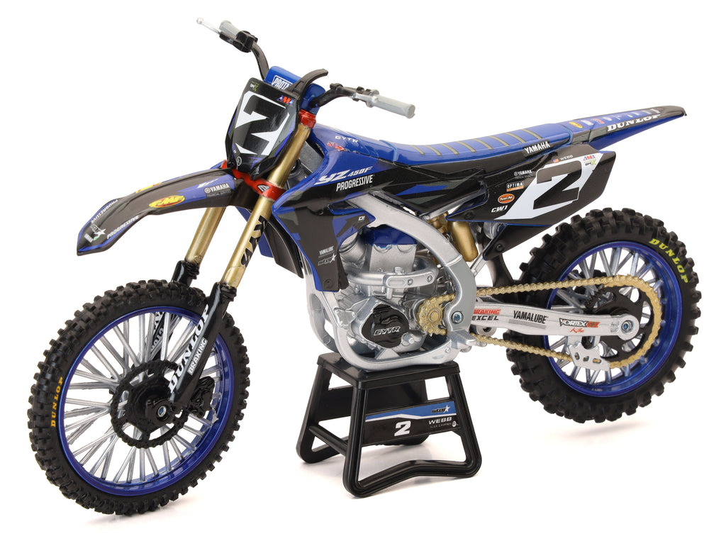 New Ray Toys 1:12 scale Yamaha Factory Racing Cooper Webb motorcycle accessories, detailed and realistic model parts.