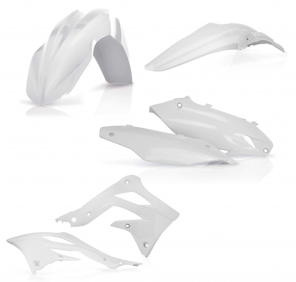 Acerbis white plastic kit for motorcycle or dirt bike with various panels and components displayed on a work surface.