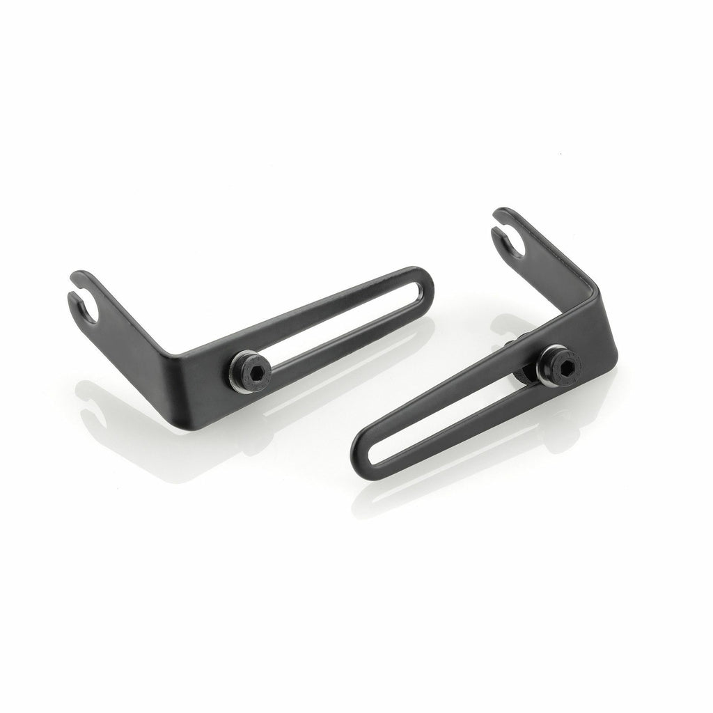RIZOMA black turn signal mounting kit with four plastic brackets for motorcycle signal lights, shown in close-up detail.