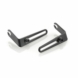 RIZOMA black turn signal mounting kit with four plastic brackets for motorcycle signal lights, shown in close-up detail.