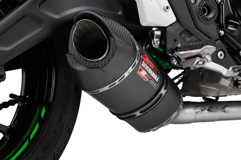 Yoshimura Race Exhaust AT2 FS SS CF Wf, high-performance motorcycle exhaust with sleek metal finish and branding details.