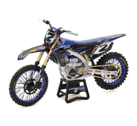 New Ray Toys 1:6 scale Yamaha Factory Racing Cooper Webb motorcycle accessory with detailed parts.