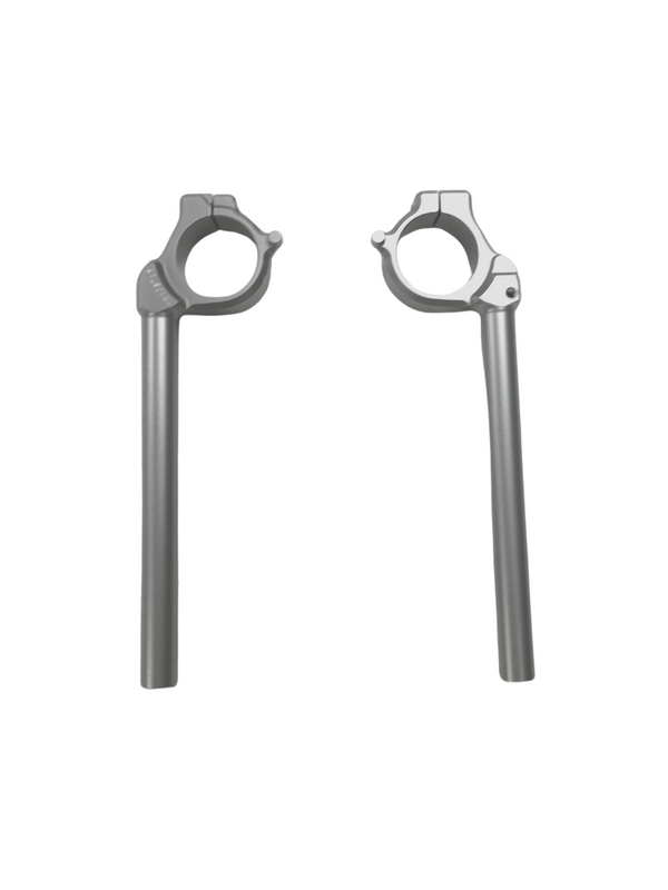 Silver HeliBars replacement handlebars for Yamaha motorcycles, showcasing the sleek, curved design and metallic finish.