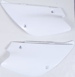 White Polisport Plastics side panels for body, model 64-6050, shown on a motorcycle with close-up of the panels' design and fit.