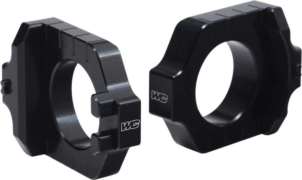 WORKS Axle Blocks Elite Kaw/Suz Black drive component with black finish, designed for motorcycle axle stabilization.