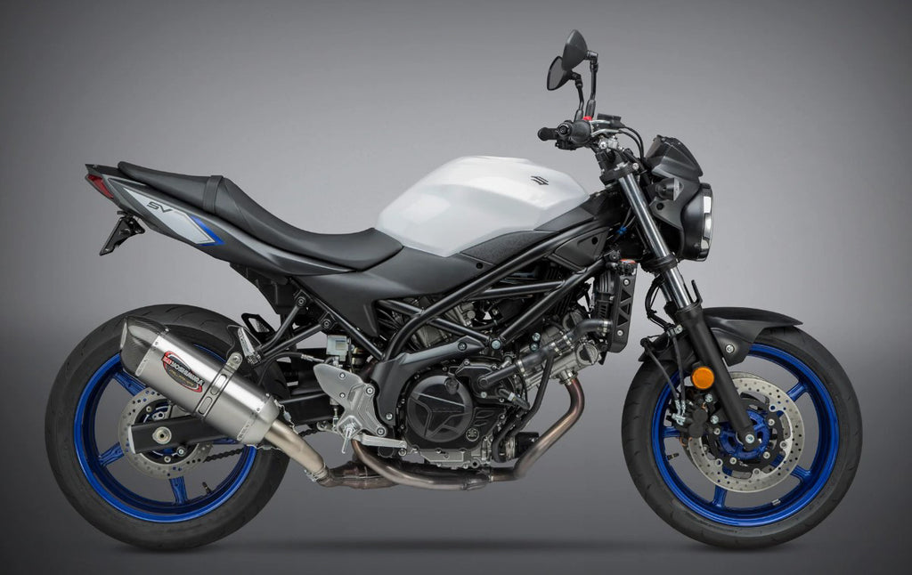 Yoshimura Street Alpha slip-on exhaust in stainless steel with carbon fiber end cap, designed for motorcycle performance and style.