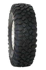 System 3 Tire XC450 28x10R14 with rugged tread pattern, designed for off-road vehicles and all-terrain performance.