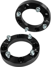 Load image into Gallery viewer, Open Trail 1-inch wheel spacer for 4/137 stud pattern, featuring 10mm x 1.25mm bolts, shown on vehicle wheel.