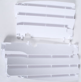 Polisport Plastics white radiator louvers for motorcycle, showing sleek plastic vents designed for cooling system protection.