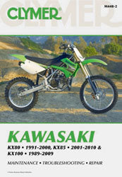 Clymer repair manual for Kawasaki KX80-100 motorcycle, showing detailed illustrations and step-by-step maintenance instructions.