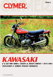 Clymer repair manual for Kawasaki Z1, KZ900, and KZ1000 motorcycles, showing the manual cover and tools on a workbench.