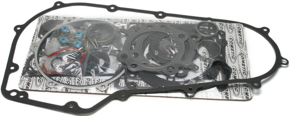 Cometic Complete Est Gasket Twin Cam Kit for motorcycle engine, featuring various gaskets and seals arranged neatly.