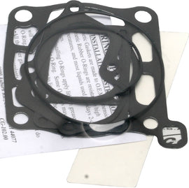 Cometic top end gasket kit for Suzuki engines, including gaskets and seals, displayed on a white background.