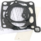 Cometic top end gasket kit for Suzuki engines, including gaskets and seals, displayed on a white background.