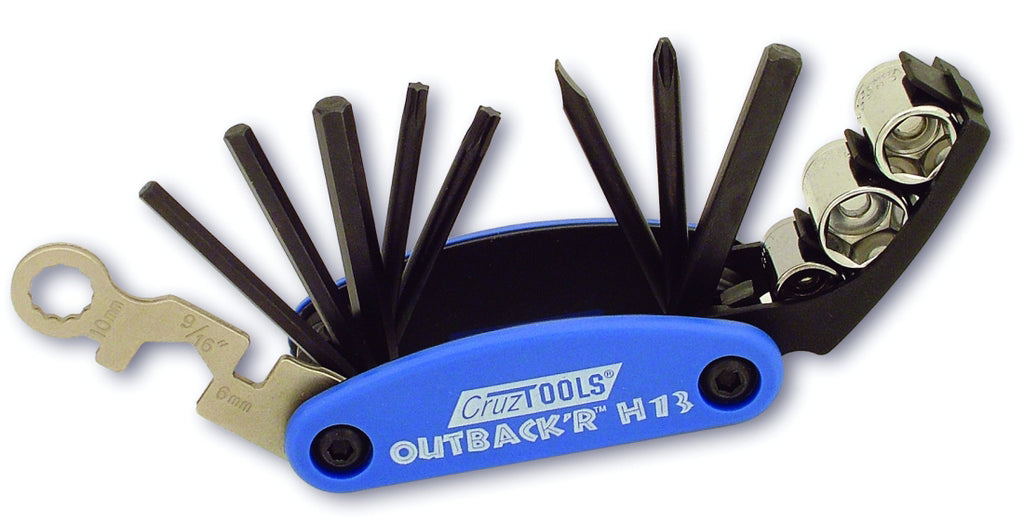 Cruztools Outback'R H13 tools set with compact black tool kit and various repair tools for motorcycle maintenance
