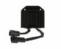 Cycle Electric Dyna 04-05 electrical regulator, black metal component for motorcycle electrical system, with wiring connections visible.