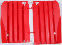 Load image into Gallery viewer, Red Polisport Plastics radiator louvers for Honda CRF250 motocross bike, showcasing the durable plastic design and vibrant color.