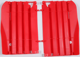 Red Polisport Plastics radiator louvers for Honda CRF250 motocross bike, showcasing the durable plastic design and vibrant color.