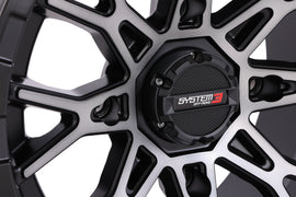 Polaris RZR System 3 St6 Wheel 14x7 matte dark tint with 4+3 offset, 4/156 bolt pattern, shown from side angle.
