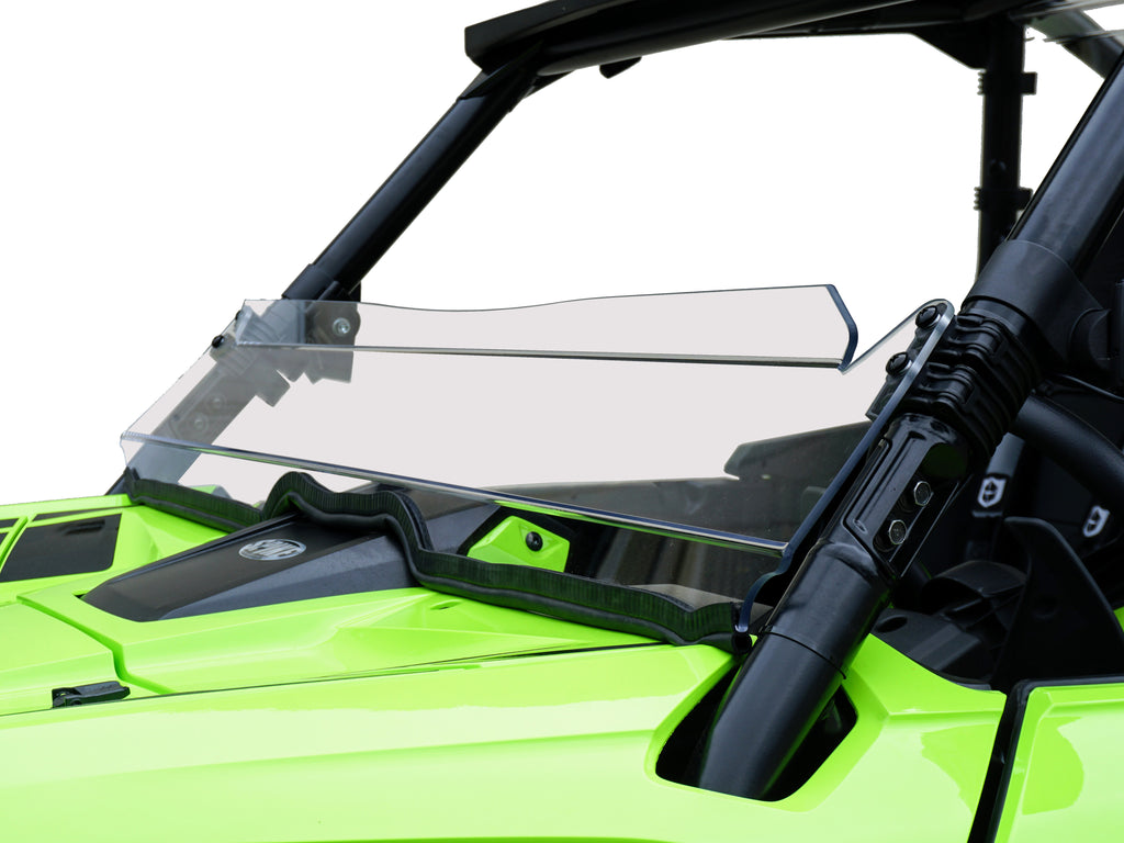 Clear Spike Powersports half windshield for motorcycle, mounted on handlebars, offering wind protection and enhanced riding experience.