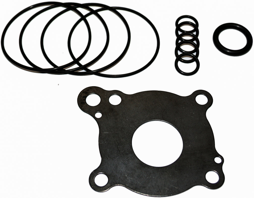Feuling engine oil pump rebuild kit 811-07001 with various gaskets and components laid out for motorcycle engine maintenance.