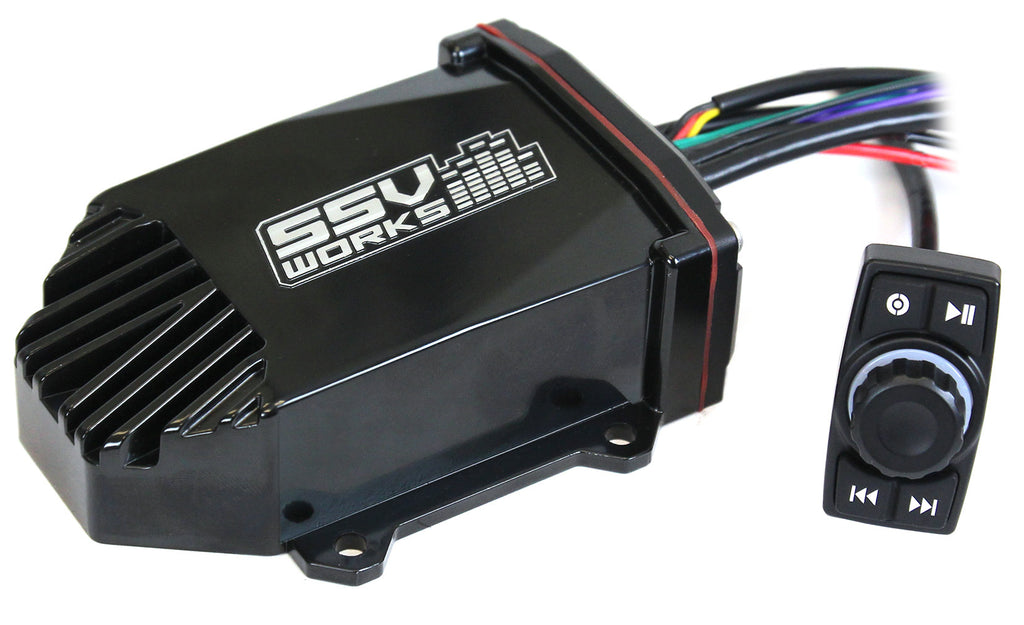 SSV Works Bluetooth rocker switch with auxiliary input, black plastic faceplate, mounted on a vehicle dashboard.