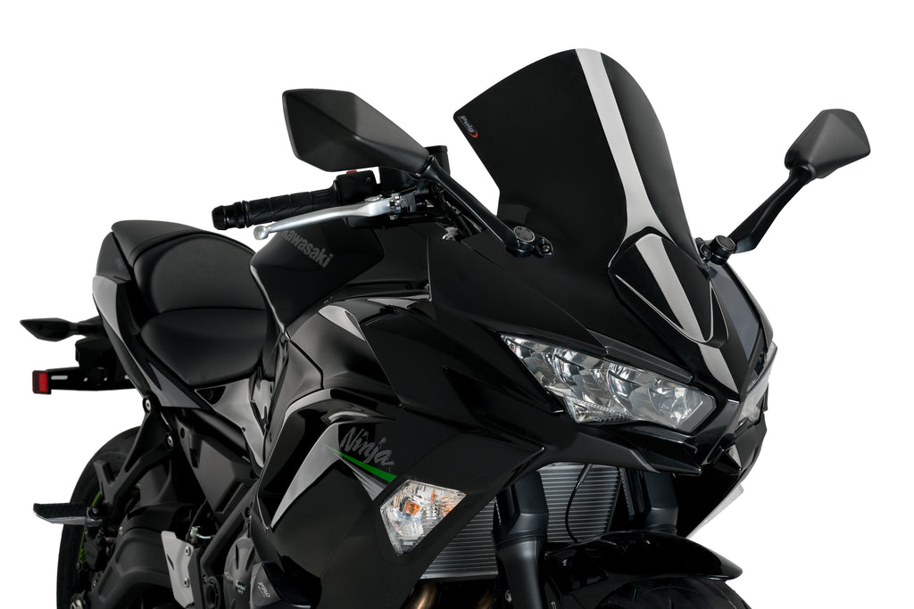 PUIG R-Racer black motorcycle windshield for Kawasaki, aerodynamic windscreen with sleek black finish, mounted on bike.