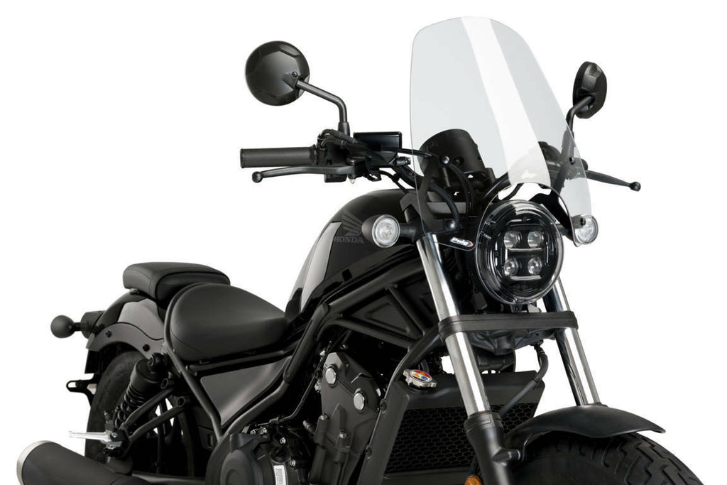 Clear Puig windscreen for Naked New Generation Touring motorcycle, providing aerodynamic protection and enhanced rider comfort.