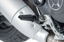 Load image into Gallery viewer, Black PUIG Sport footpegs for motorcycle foot controls, showing textured surface and mounting points for secure grip.
