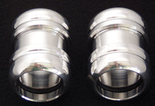 Load image into Gallery viewer, ModQuad universal exhaust clamp for 1 to 1-3/16 inch grooves, showing the metal clamp with grooved design on a plain background.