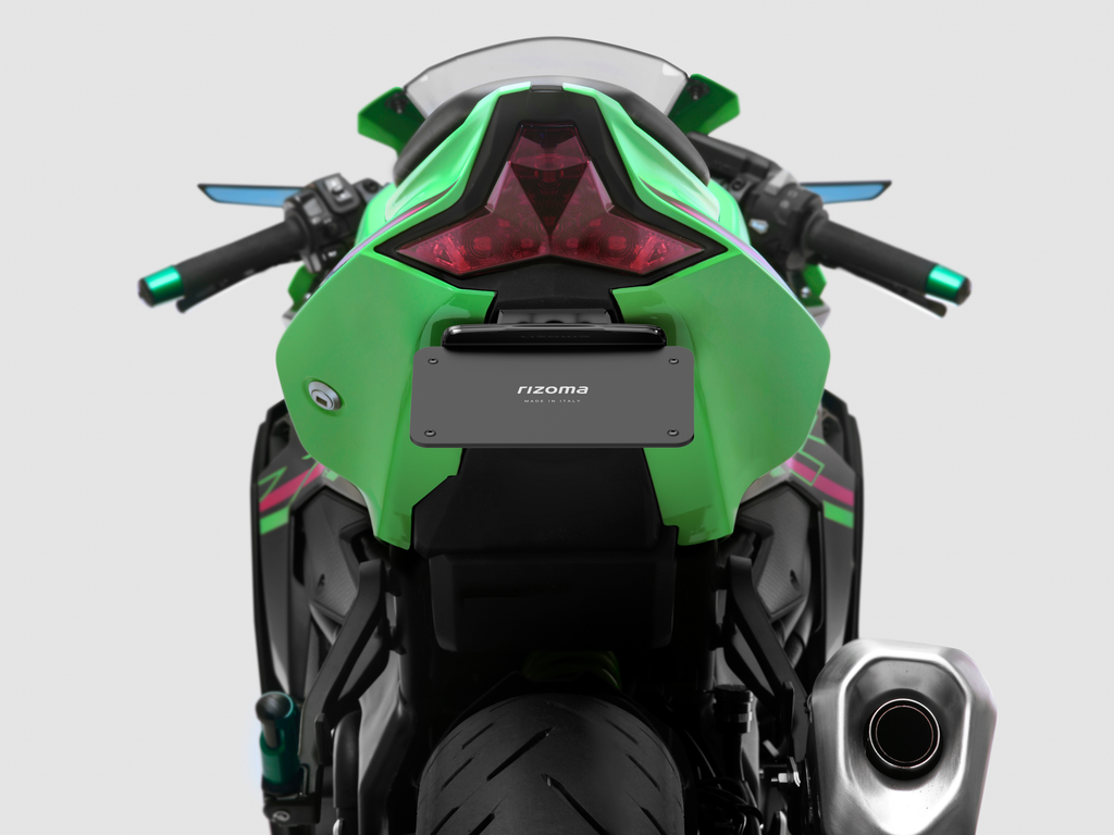 RIZOMA Flat-Out Fender Eliminator body kit for Kawasaki motorcycle, showing sleek black design and mounting hardware.