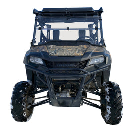 Open Trail folding windshield for off-road vehicles, clear windscreen with black frame, folded in the image.