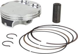 Vertex forged replica piston kit 175-24615A with multiple piston components and rings for engine performance.