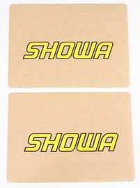 DCOR Showa yellow upper fork decal graphic for motorcycle, featuring bold yellow and black design on a Showa fork.