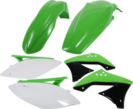 Acerbis green plastic kit with various unassembled motorcycle parts, including fenders and panels, laid out on a flat surface.