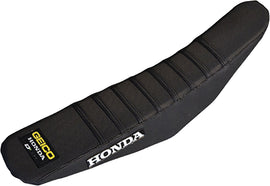 Black DCOR Gripper seat cover with ribbed design, fits standard vehicle seats, provides durable protection and secure fit.