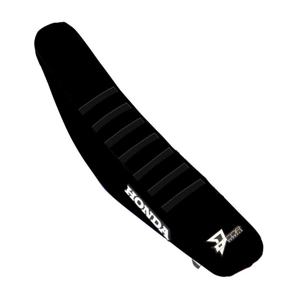 Black DCOR seat cover with ribbed design for Honda CRF250 and CRF450 motorcycles, model 862-10473.