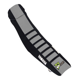 Black and grey DCOR seat cover with ribbed design, fits Yamaha YZF250 and YZF450 motocross bikes.