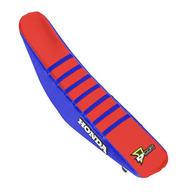 Blue and red DCOR seat cover with ribs, designed for car seats, featuring a durable fabric and ribbed texture for added comfort.