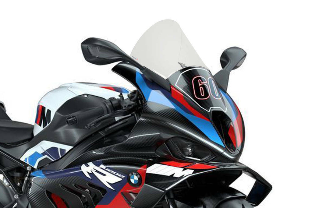 Clear PUIG R-Racer windscreen for BMW motorcycle, showing the transparent, curved windshield with mounting edges.
